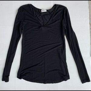 Black long sleeve shirt with strappy T design